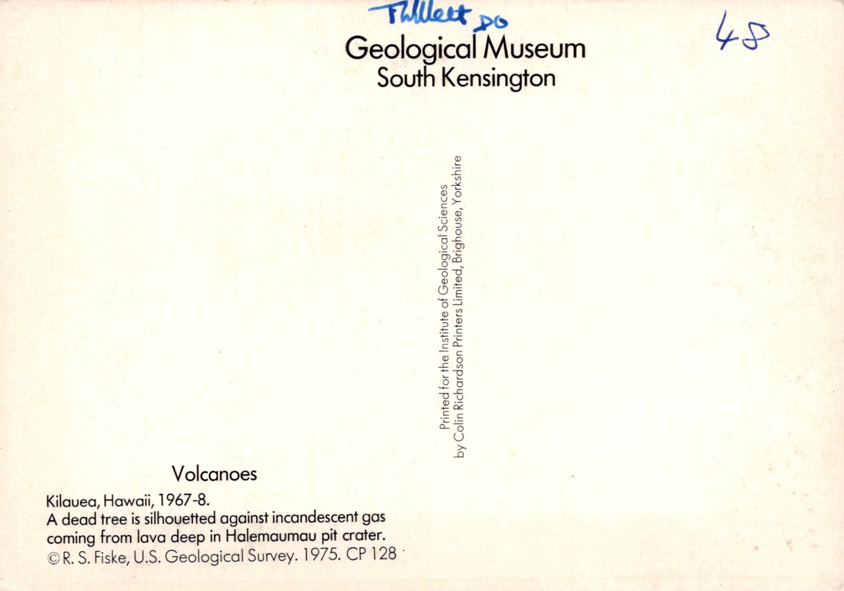 Label from Geological Museum South Kensington with text about volcanoes and a signature.