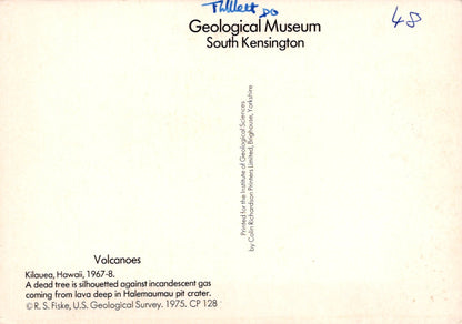 Label from Geological Museum South Kensington with text about volcanoes and a signature.