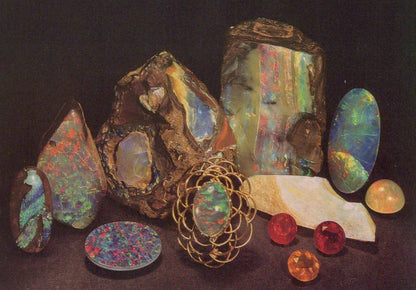 Collection of opal stones and crystals on a dark background