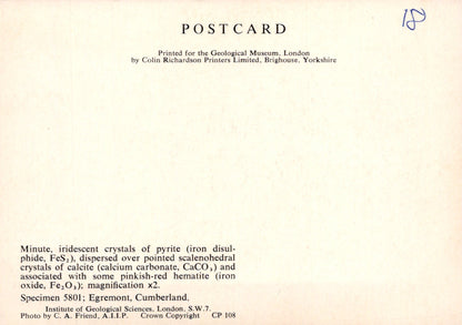 Vintage postcard with text about mineral crystals, printed for the Geological Museum, London.