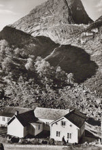 Load image into Gallery viewer, Vintage black and white photo of houses nestled in a mountainous landscape
