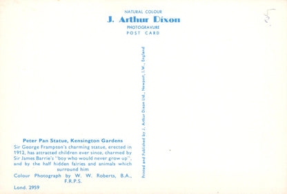 Back of a postcard with text about the Peter Pan statue in Kensington Gardens, London, featuring J. Arthur Dixon's photography.
