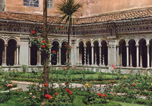 Load image into Gallery viewer, Cloister with columns and a garden with flowers in front of a building
