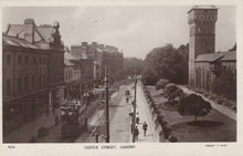 Load image into Gallery viewer, Vintage black and white photograph of Castle Street, Cardiff with buildings and a tram.
