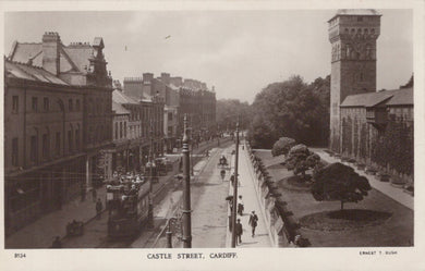 Vintage black and white photograph of Castle Street, Cardiff with buildings and a tram.