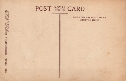 Vintage postcard with text and a line for address on a brown background