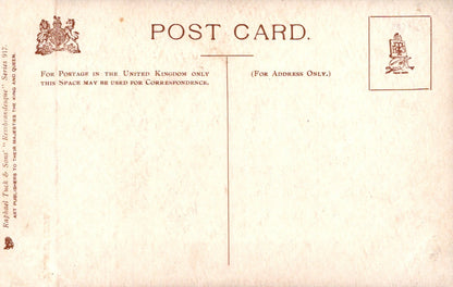 Vintage postcard with text and stamps on a beige background