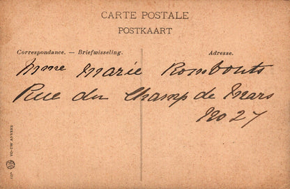 Vintage postcard with handwritten text on a beige background