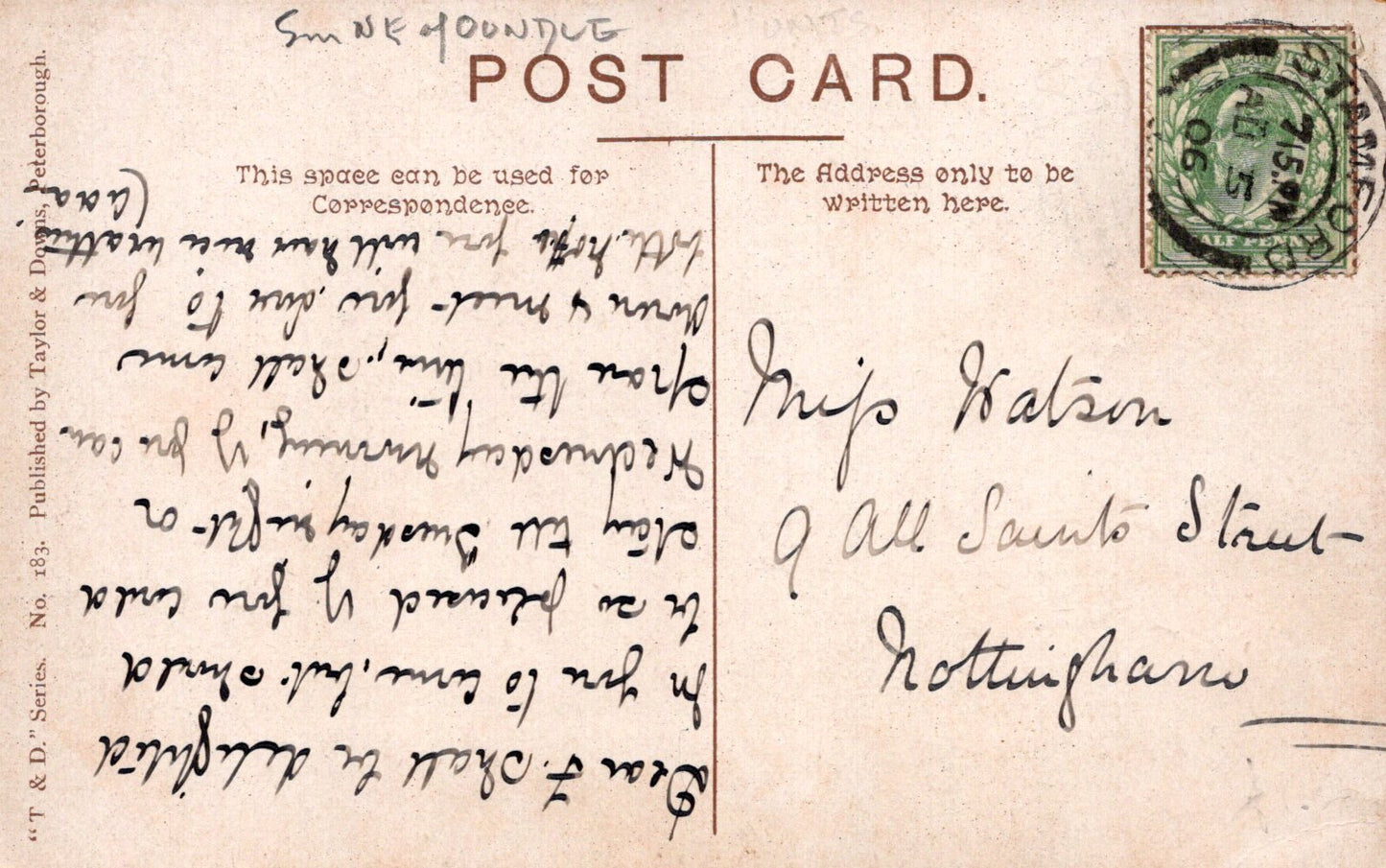 Vintage postcard with handwritten text and a stamp, featuring a brown background.