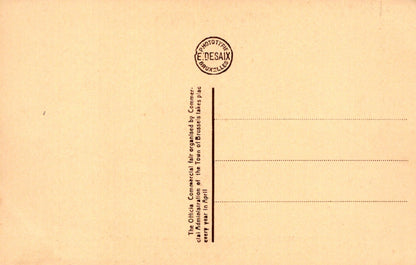 Vintage postcard with a stamp and text on a beige background