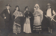 Load image into Gallery viewer, Group of people in traditional costumes posing for a photograph
