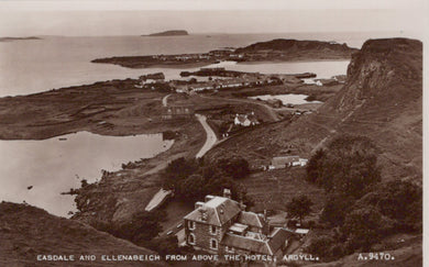 Vintage black and white photograph of a coastal landscape with buildings and a hotel, featuring the text 'Easdale and Ellenabeich from above the Hotel, Argyll'.