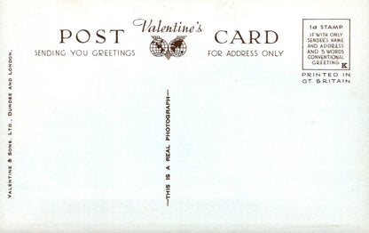 Vintage Valentine's card with text and a stamp design on a white background