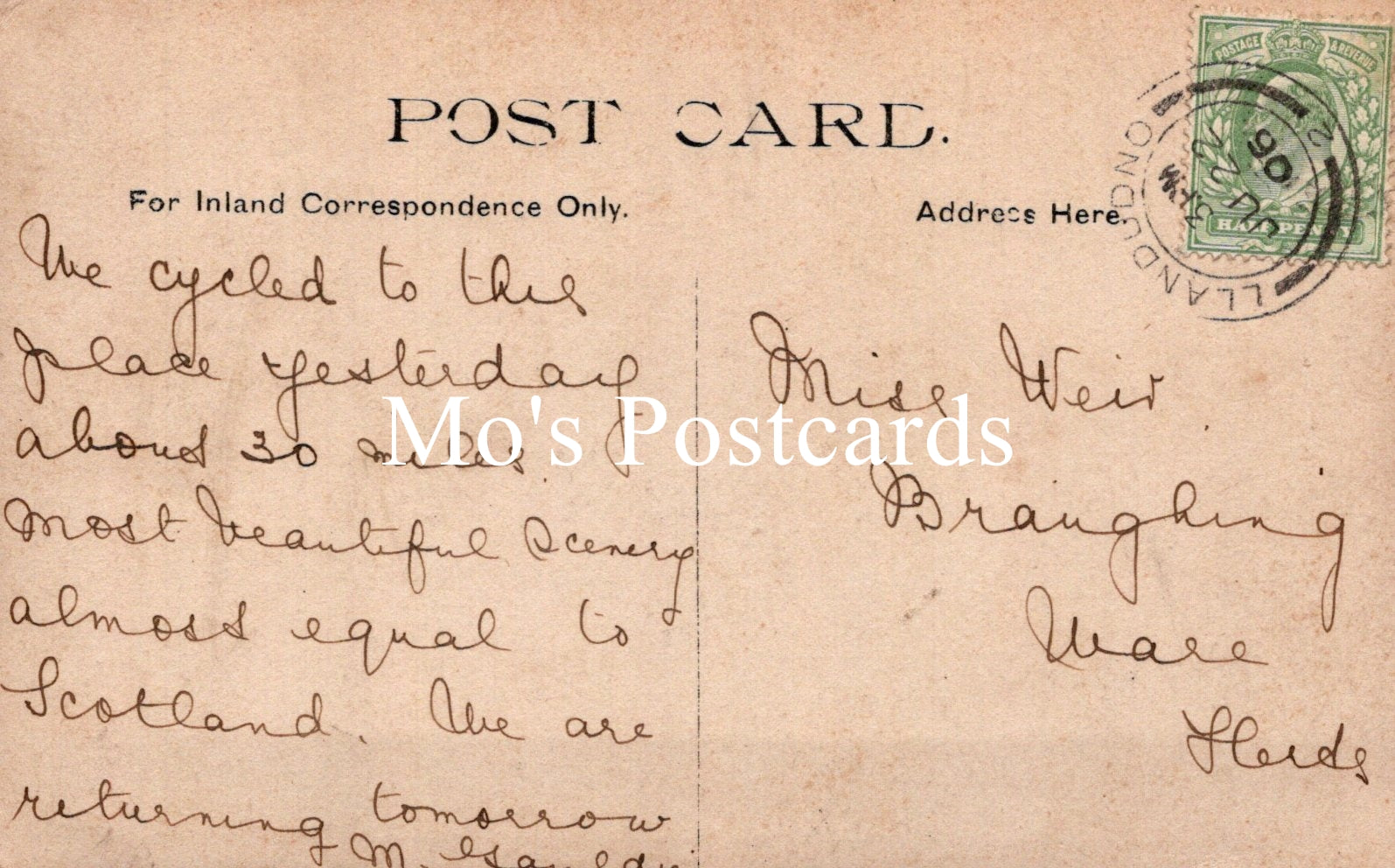 Vintage postcard with handwritten text and a stamp, featuring the brand 'Mo's Postcards'.