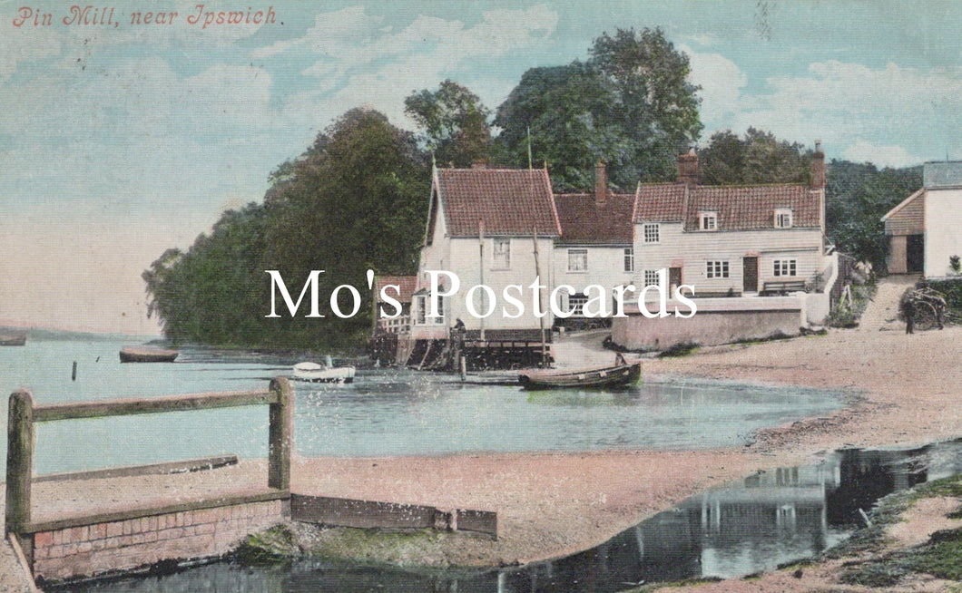 Vintage postcard of a mill by a river  