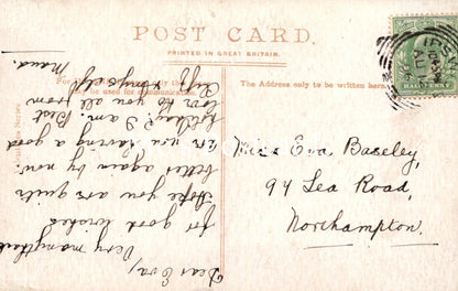 Vintage postcard with handwritten text and a stamp, printed in Great Britain.