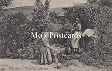 Load image into Gallery viewer, Vintage black and white postcard of two women in a garden.
