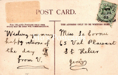 Vintage postcard with handwritten text and a stamp 