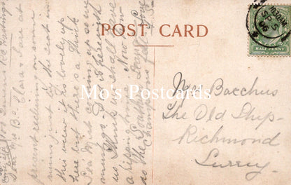 Vintage postcard with handwritten text and a stamp, featuring the brand 'Mo's Postcards'.