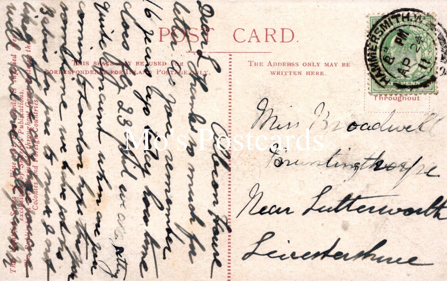 Vintage postcard with handwritten text and a stamp, featuring a red border.