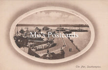 Load image into Gallery viewer, Vintage-style image of a pier with ships and people 
