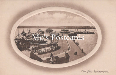 Vintage-style image of a pier with ships and people 