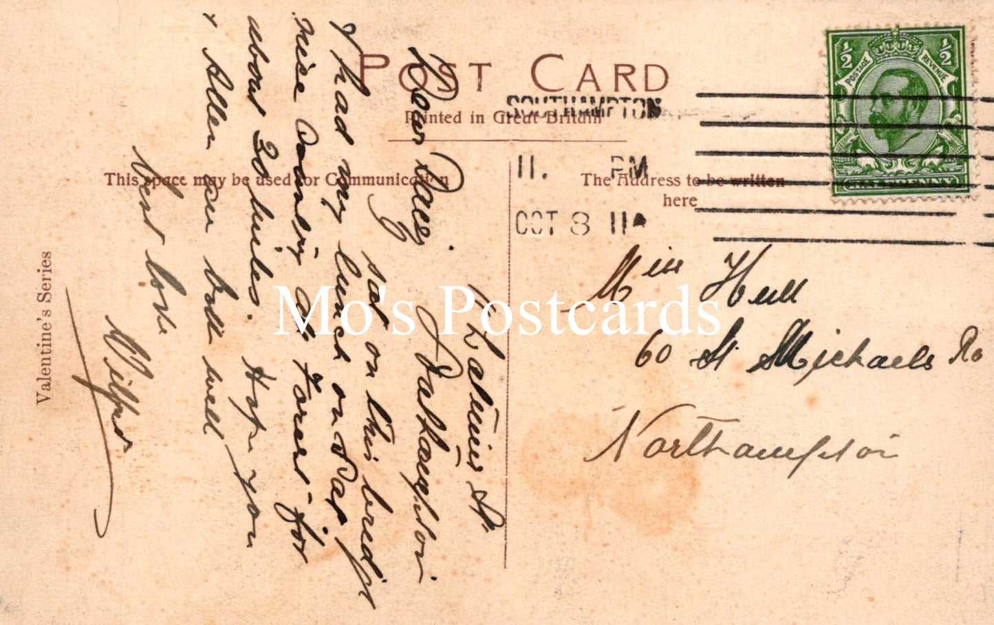 Vintage postcard with handwritten text and a stamp 