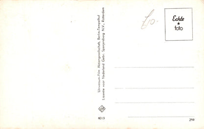 Back of a postcard with text and a logo, featuring the brand 'Echte foto'.