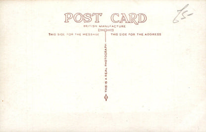 Vintage postcard with text and design elements on a beige background