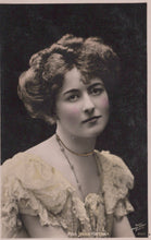 Load image into Gallery viewer, Vintage black and white portrait of a woman with styled hair and lace dress.
