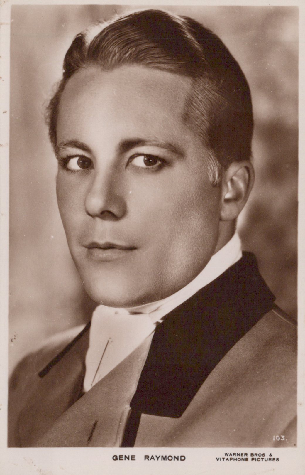 Vintage black and white portrait of a man in formal attire with a blurred background