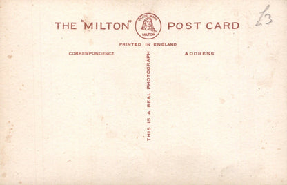 Back of a Milton postcard with text and logo