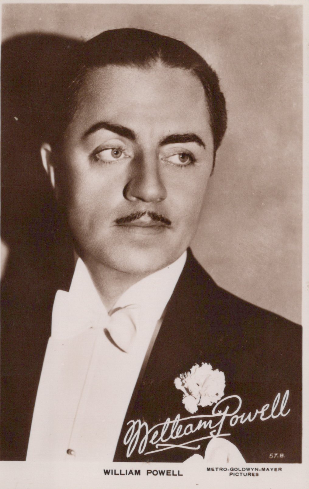 Vintage black and white portrait of a man with a signature, likely an actor, against a plain background.