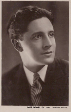 Vintage black and white portrait of Ivor Novello with a formal attire.