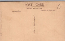 Load image into Gallery viewer, Back of a vintage postcard with text on a brown background
