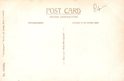 Vintage postcard with text and a signature on a beige background