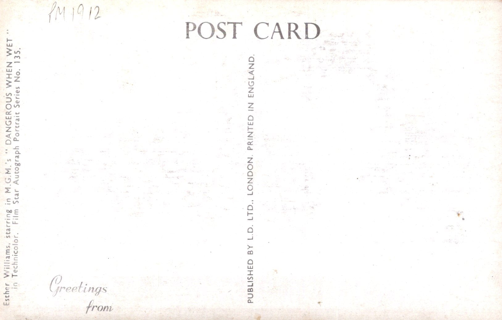 Back of a vintage postcard with text and a light brown background