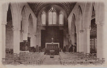 Load image into Gallery viewer, Interior of a church with pews and a altar, vintage photograph.
