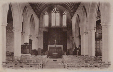 Interior of a church with pews and a altar, vintage photograph.