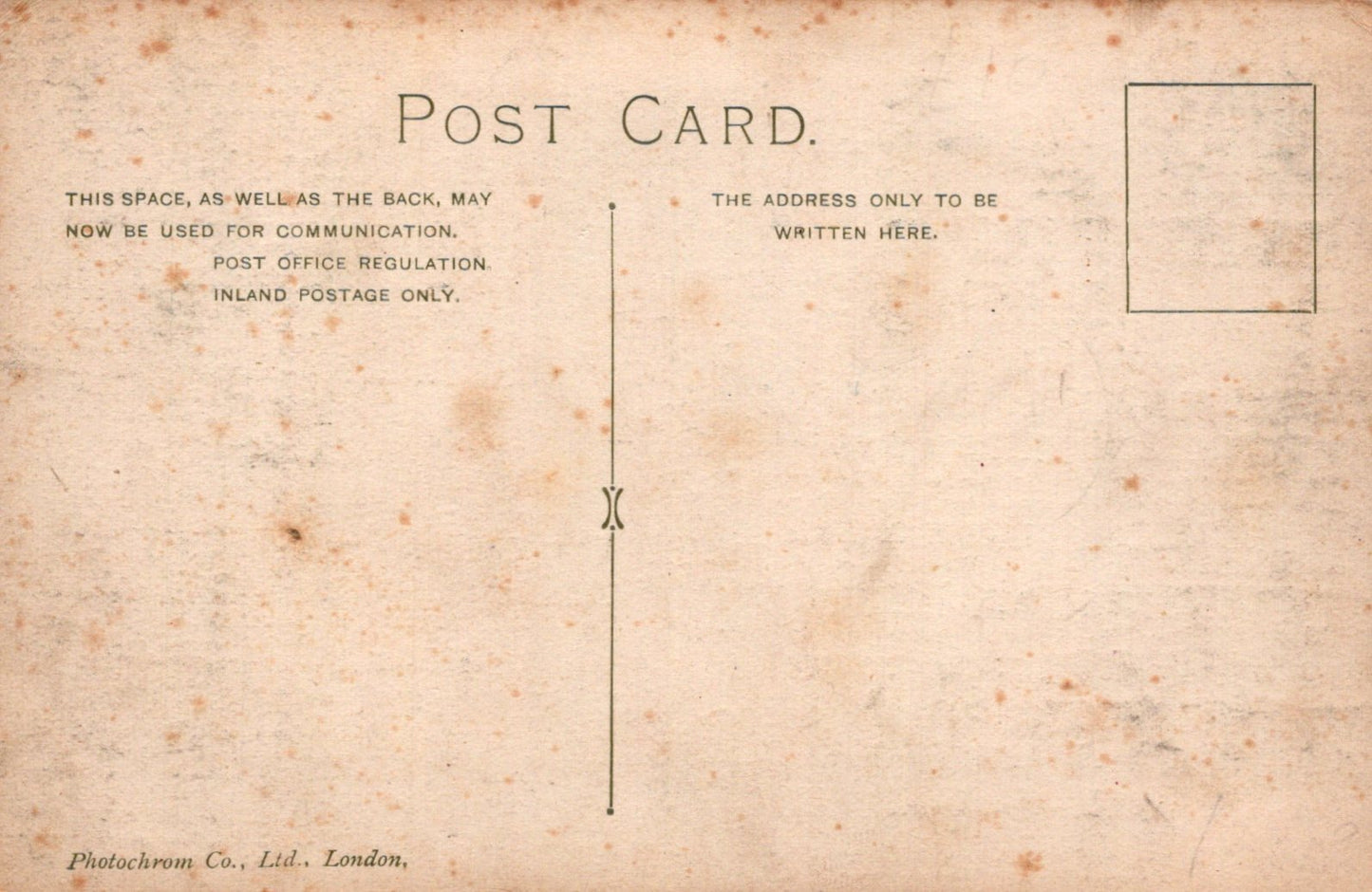 Vintage postcard with text and a rectangular area for writing on a textured beige background.