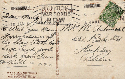 Vintage postcard with handwritten text and a stamp, featuring a call to buy war bonds.