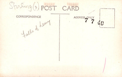 Vintage postcard with handwritten text and a number on a light background