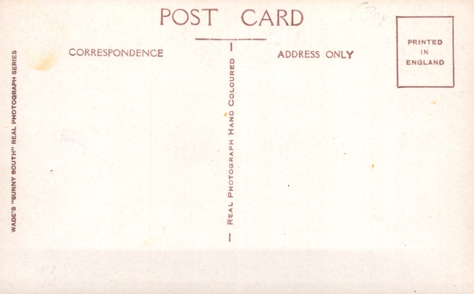 Back of a postcard with typographic text on a beige background