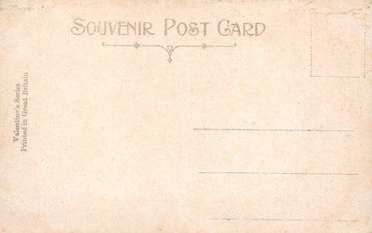 Vintage-style souvenir postcard with text and decorative elements.