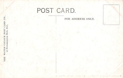 Back of a vintage postcard with text and a white border