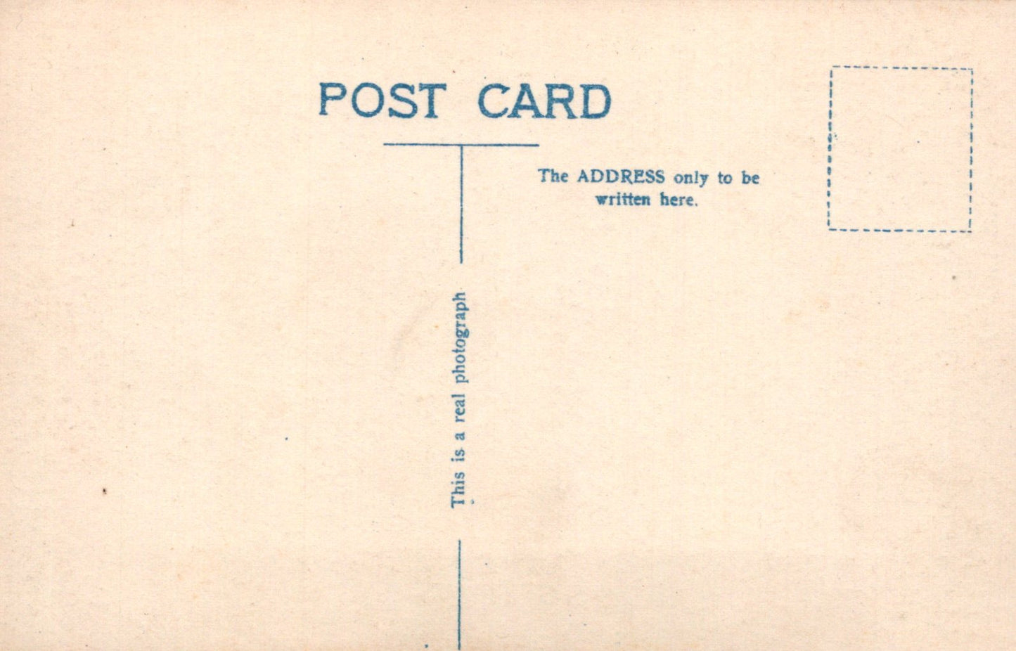 Back of a postcard with text and a rectangular area for writing.