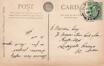 Vintage postcard with text and postage stamp