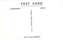 Load image into Gallery viewer, Back of a postcard with text and a signature
