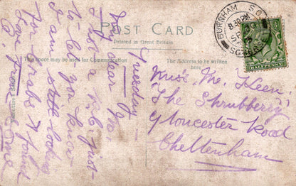 Vintage postcard with handwritten text and a stamp, featuring a green stamp on a beige background.