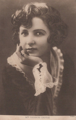 Vintage black and white portrait of a woman with lace gloves